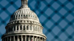 WASHINGTON, DC - NOVEMBER 7:   Capitol Hill is seen through a fence as workers construct viewing stands in front of the White House for the Inaugural Parade on November 7, 2008 in Washington, DC. President-elect Barack Obama will be sworn in as the 44th President of the United States on January 20, 2009 in Washington DC.  (Photo by Brendan Smialowski/Getty Images)