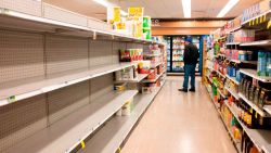 Empty shelfs of toilet paper are seen inside a store in March 18, 2020 in New York City. - The coronavirus outbreak has transformed the US virtually overnight from a place of boundless consumerism to one suddenly constrained by nesting and social distancing. (Photo by Johannes EISELE / AFP) (Photo by JOHANNES EISELE/AFP via Getty Images)
